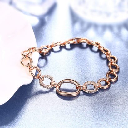 Chain bangle made from rose gold and inlaid with two diamonds