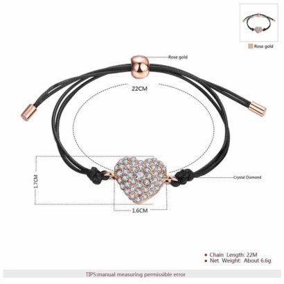 Leather bangle inlaid with special rose gold pieces and a heart of diamond