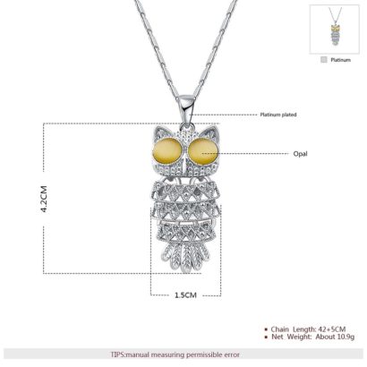 The owl necklace plated with platinum and the eyes are inlaid with brown opals.