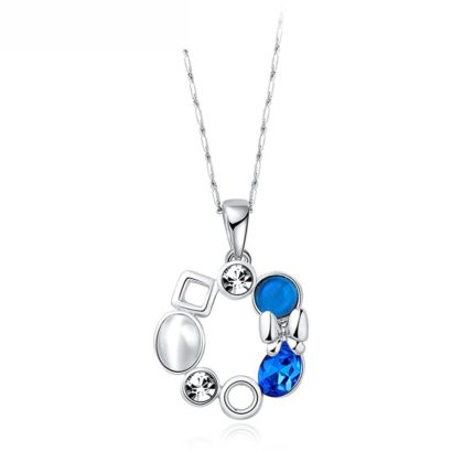 A unique design of combined ornaments plated with platinum, inlaid with white opal, blue glass stone and a crystal diamond