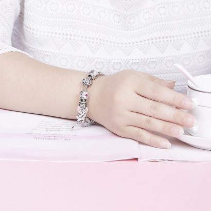 Lovely mother and daughter bangle inlaid with pink crystals and special ornaments