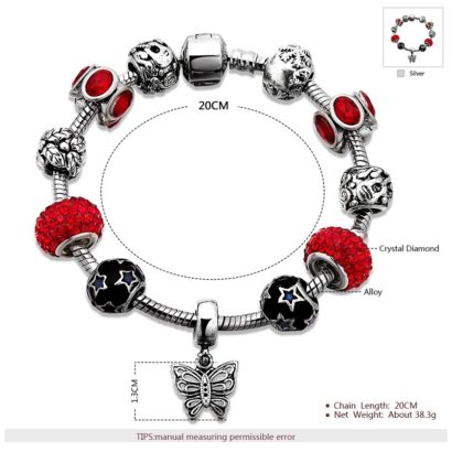 Silver bangle inlaid with special ornaments and red crystal diamonds and a unique design of butterfly