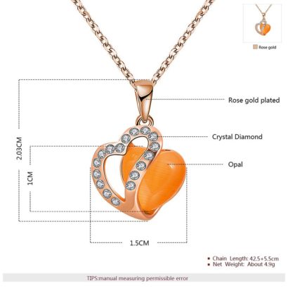 Heart necklace, plated with gold and inlaid with white crystals and an orange opal