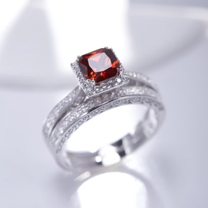 Luxurious silver 925 twins ring inlaid with red zircon and side white special crystals