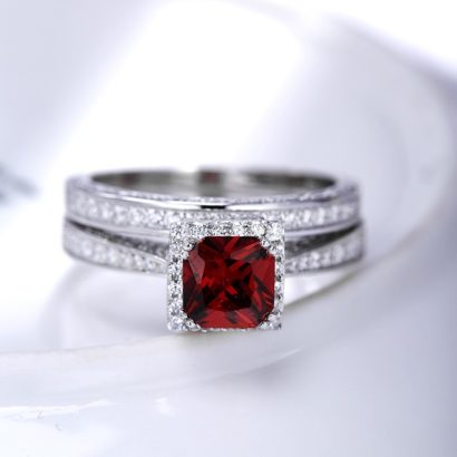 Luxurious silver 925 twins ring inlaid with red zircon and side white special crystals